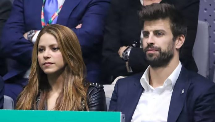 Shakira y Piqué asisten a juego de su hijo y se sientan separados